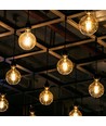 E27 7W dimbar LED pære - G95, Amber glass, Filament, 2200K, erstatter 53W